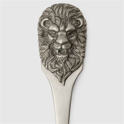 Spoon with lion head handle, set of two .